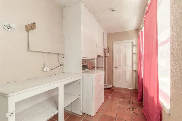 a bathroom with a white bath tub