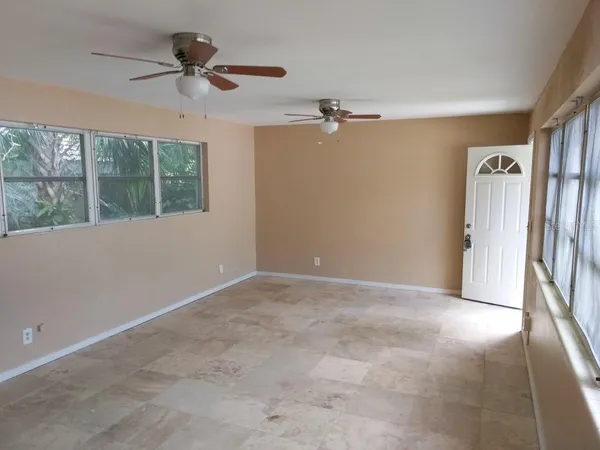 a bathroom with a sink a toilet a mirror and bathtub