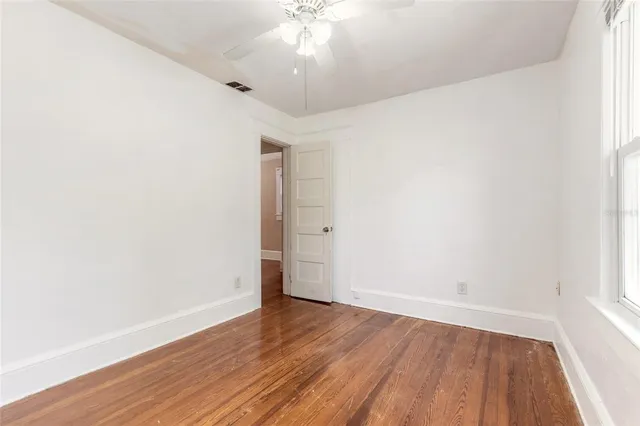 an aerial view of residential houses with city view