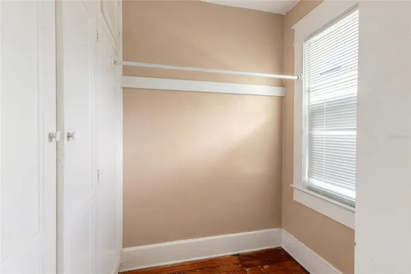 an aerial view of residential building and lake