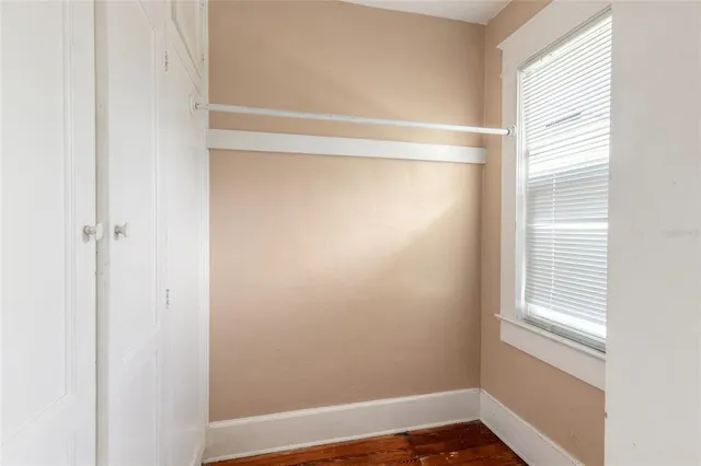 an aerial view of residential building and lake