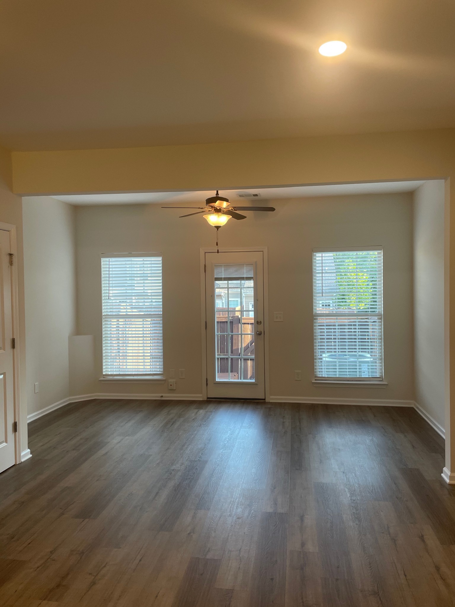2083 Hemlock Drive Spring Hill, TN 37174 - Photo 13 of 30 a view of an empty room with wooden floor and a window