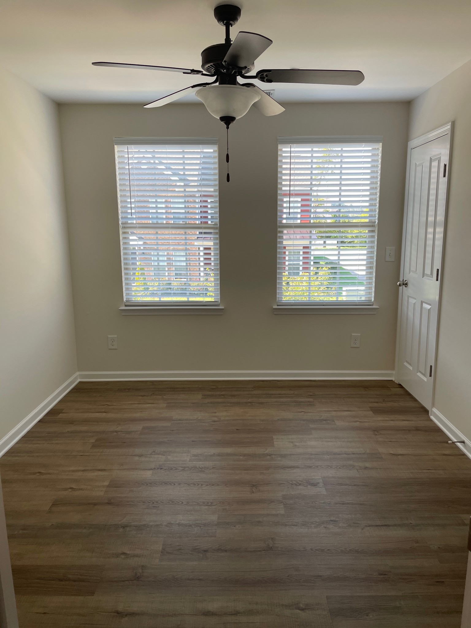 2083 Hemlock Drive Spring Hill, TN 37174 - Photo 17 of 30 a view of an empty room with wooden floor and a window