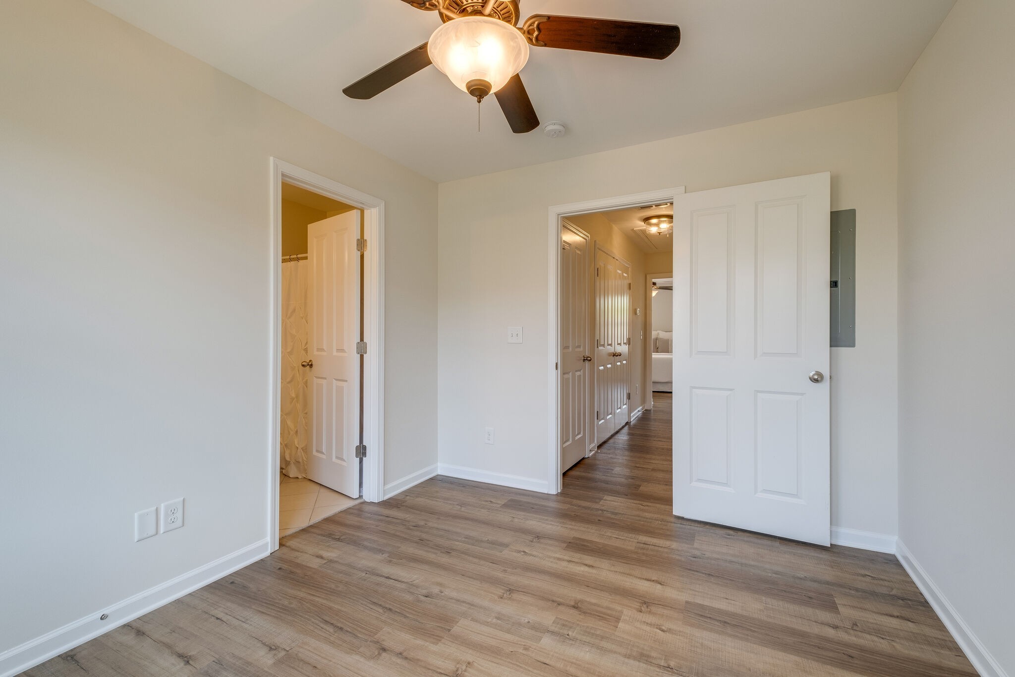 2083 Hemlock Drive Spring Hill, TN 37174 - Photo 18 of 30 wooden floor in an empty room with a window