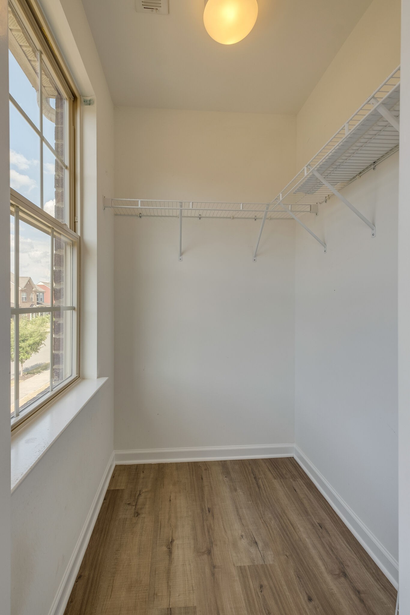 2083 Hemlock Drive Spring Hill, TN 37174 - Photo 21 of 30 a view of a small space with wooden floor and windows