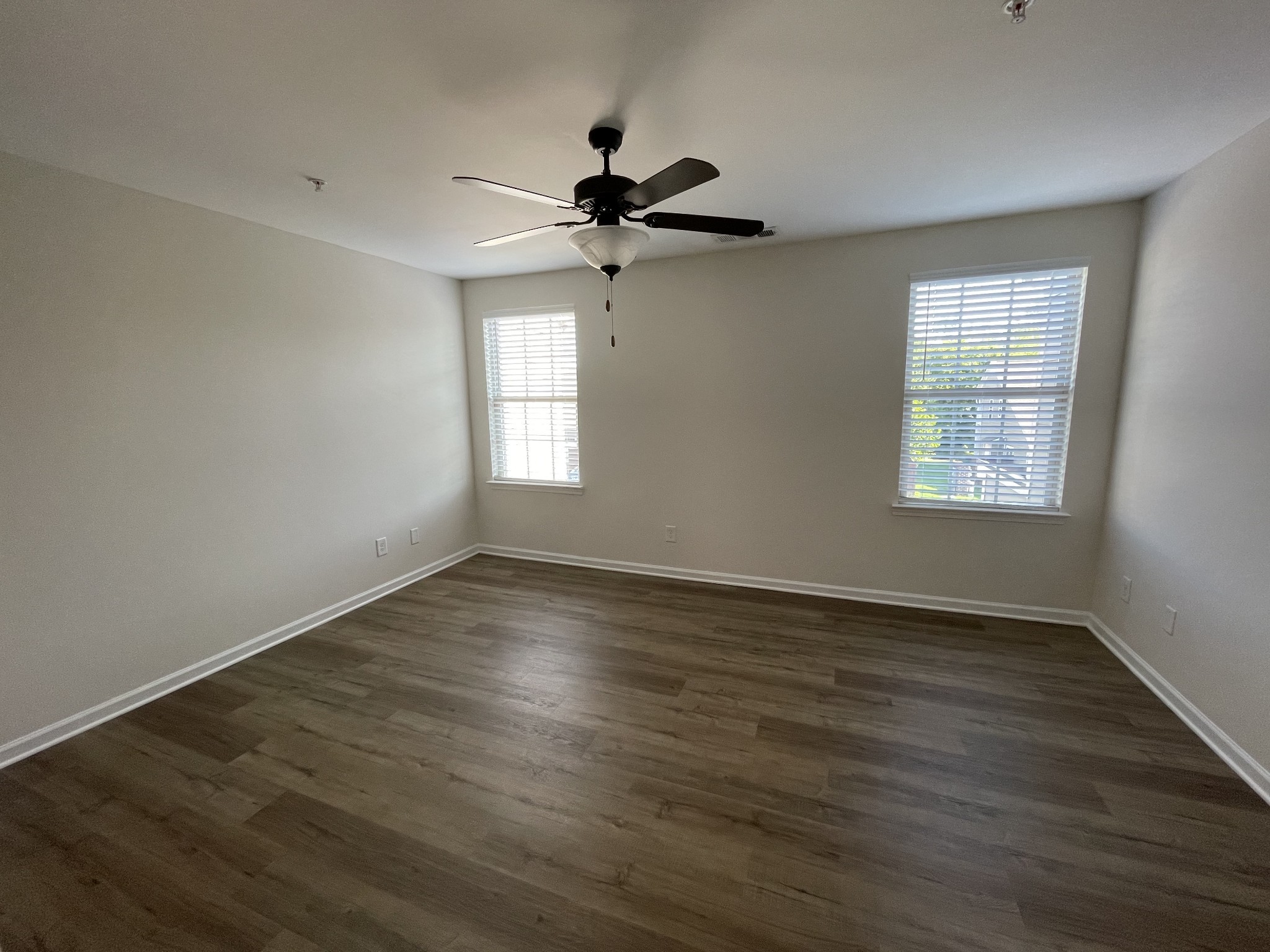 2083 Hemlock Drive Spring Hill, TN 37174 - Photo 22 of 30 a view of an empty room with wooden floor and a window