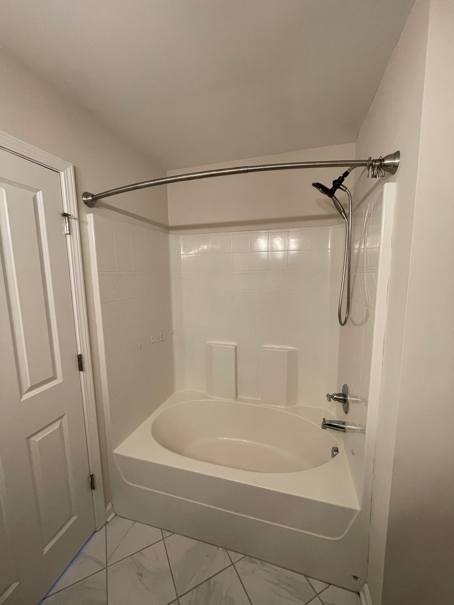 2083 Hemlock Drive Spring Hill, TN 37174 - Photo 24 of 30 a bathroom with a shower and a bath tub