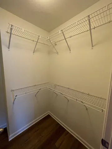 a view of a room with racks on the wall