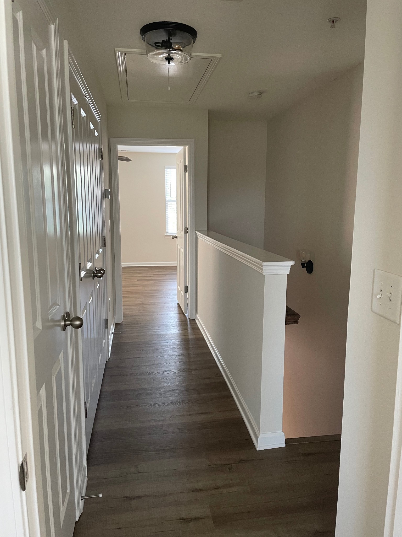 2083 Hemlock Drive Spring Hill, TN 37174 - Photo 26 of 30 a view of a hallway with wooden floor