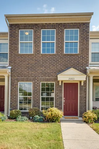 a front view of a house having yard
