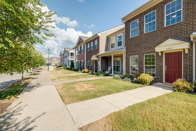 a house with yard in front of it