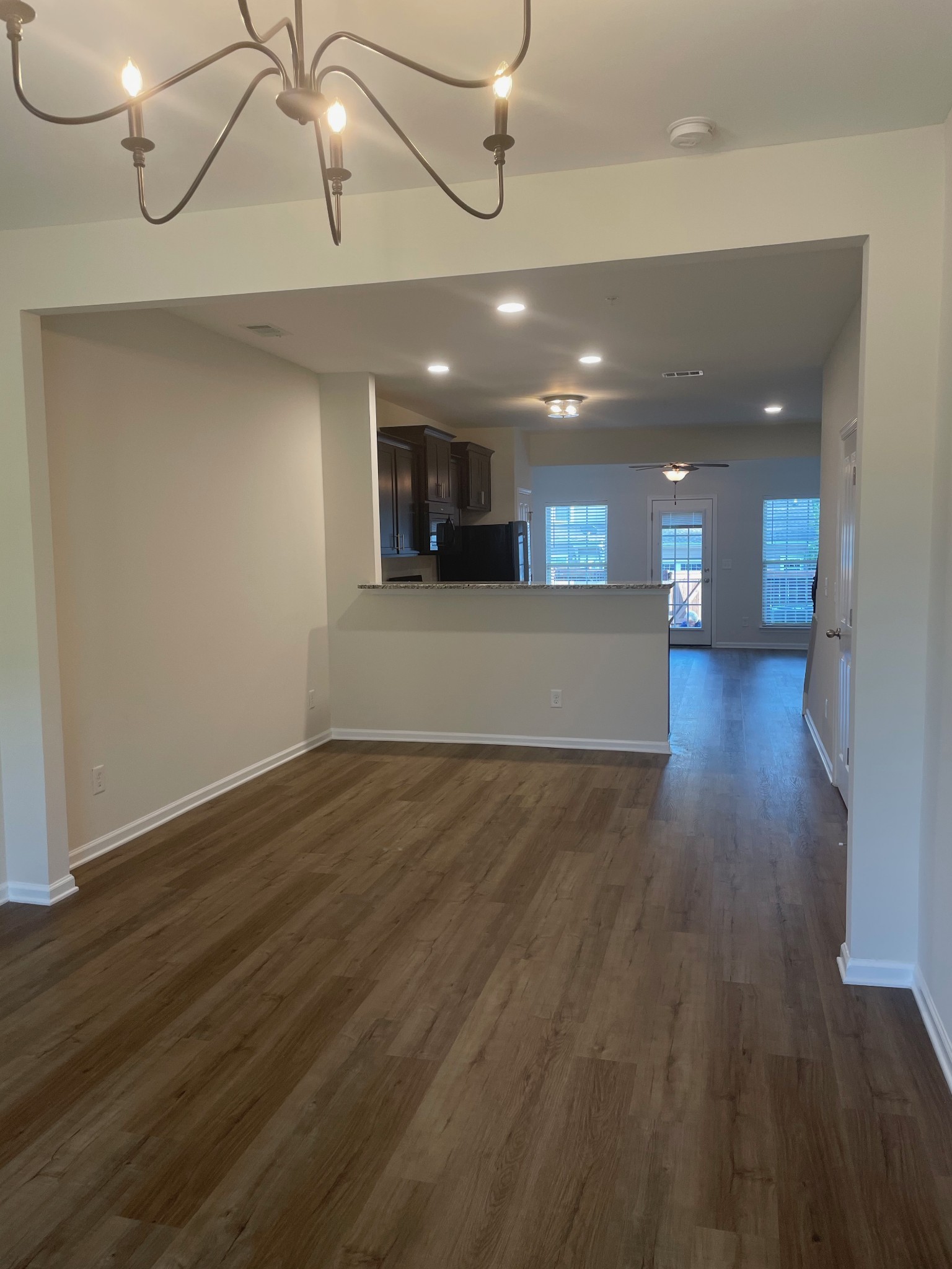 2083 Hemlock Drive Spring Hill, TN 37174 - Photo 7 of 30 a view of a room with a dishwasher and wooden floor