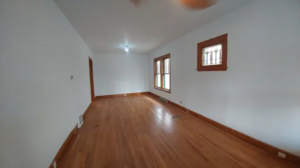 a view of an empty room and window