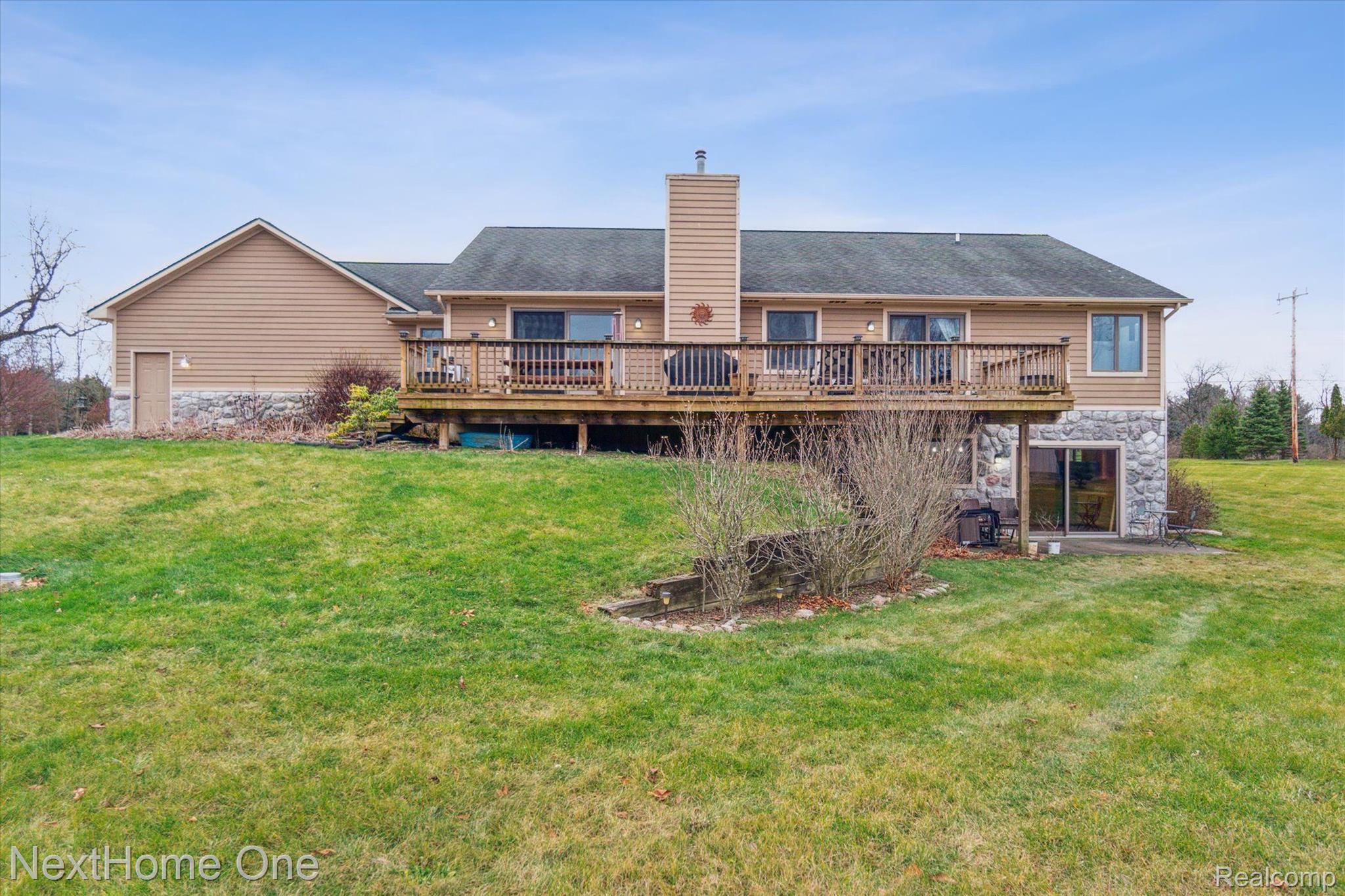 7463 Faussett Road Fenton, MI 48430 - Photo 35 of 53 gorgeous rear view