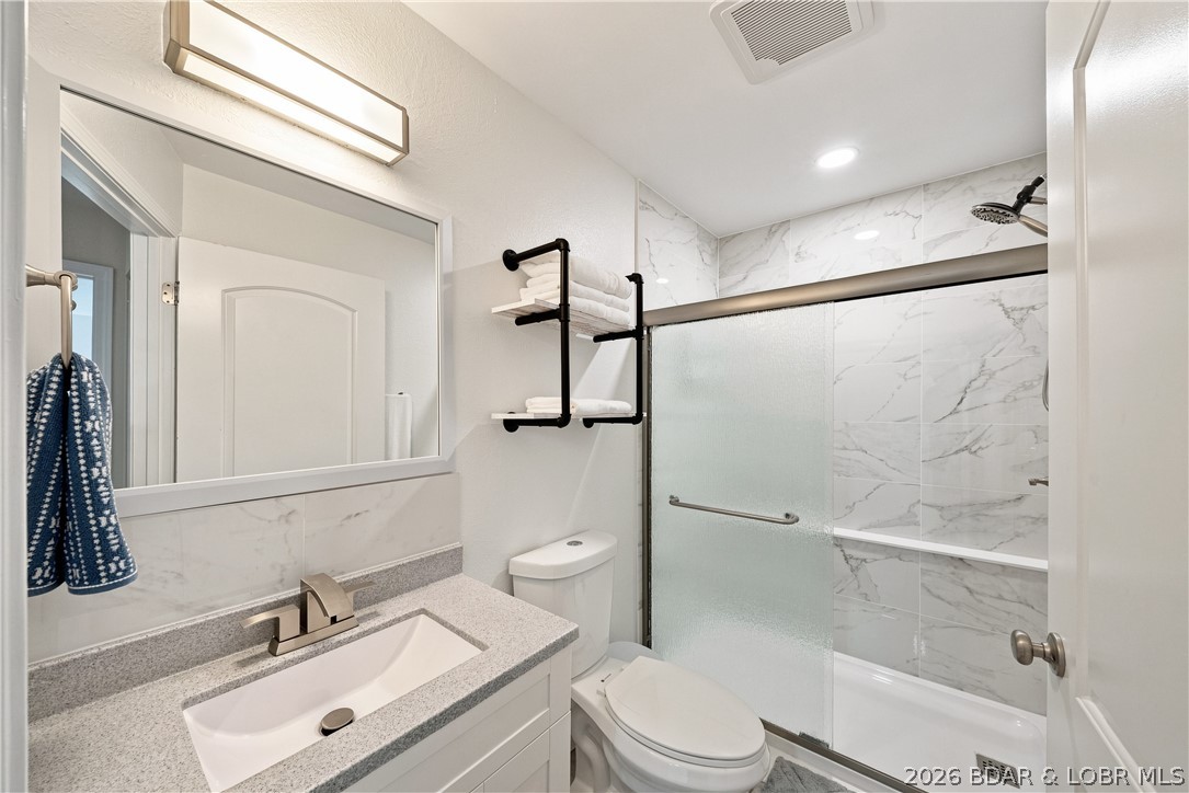 37 Hampton Bay Road, Unit 1 Eldon, MO 65026 - Photo 17 of 35 Brand new bathroom