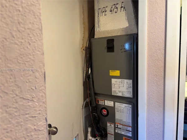 a bathroom with a sink mirror toilet and shower