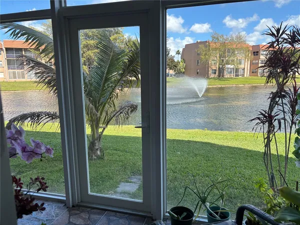 a view of swimming pool from a room