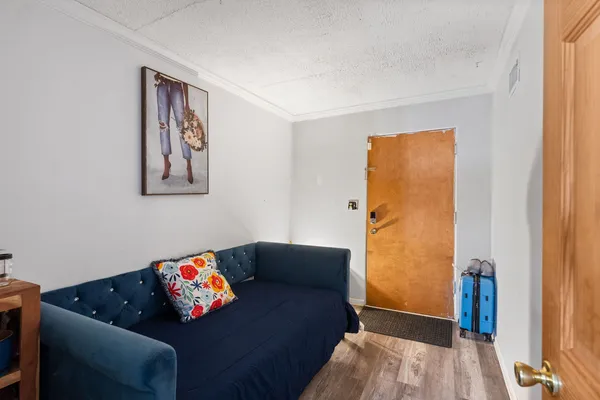 a living room with furniture and a gate
