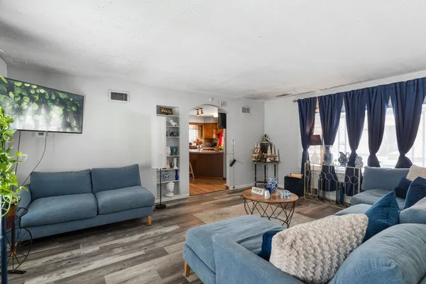 a living room with furniture and a couch