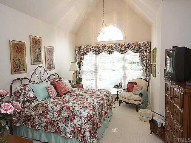 2913 Tillinghast Trail Raleigh, NC 27613 - Photo 7 of 12 Master bedroom is on the main level and also has a cathedral ceiling. Other