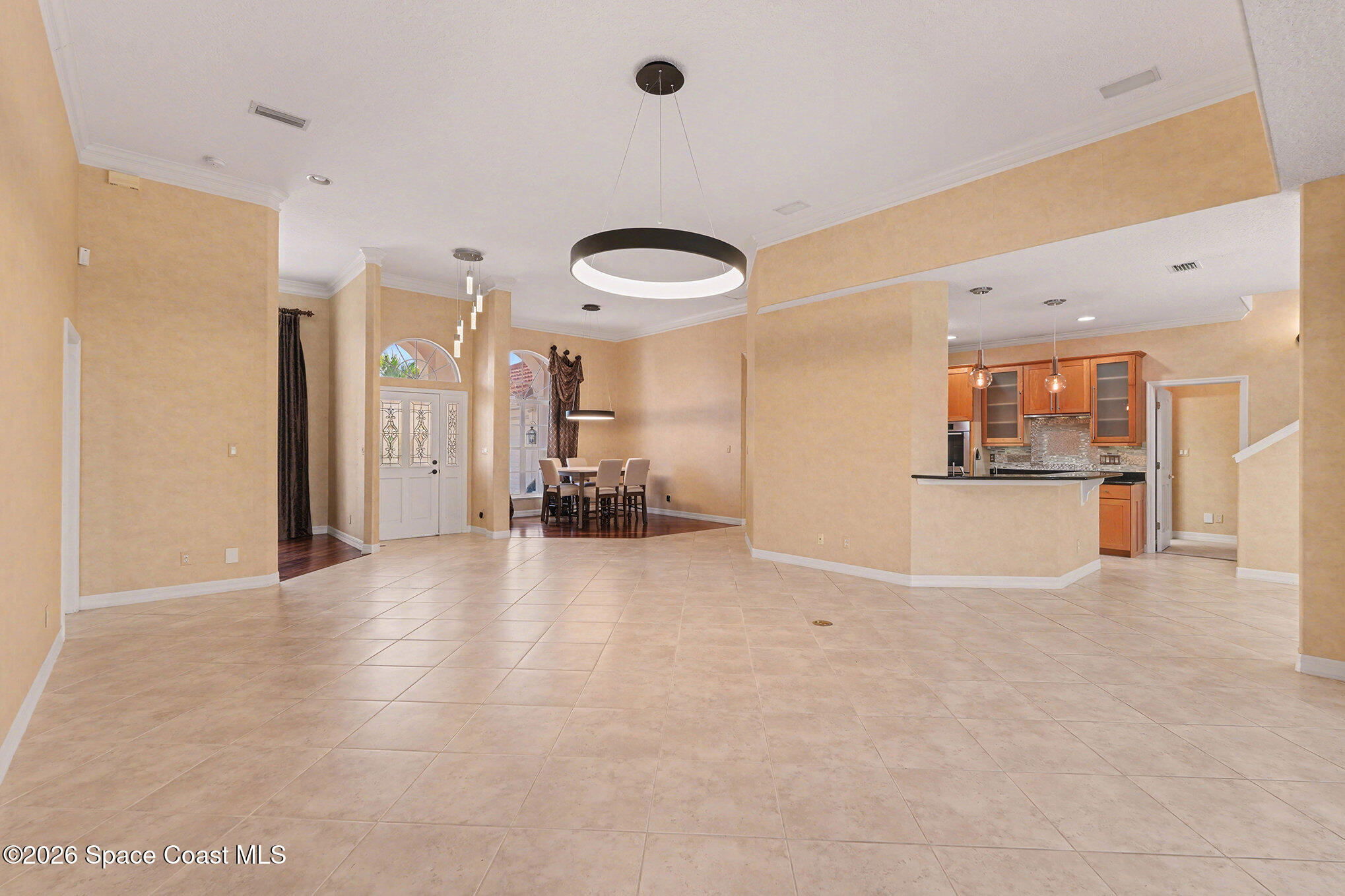 4325 Collingtree Drive Rockledge, FL 32955 - Photo 6 of 35 a view of a livingroom with furniture and a kitchen