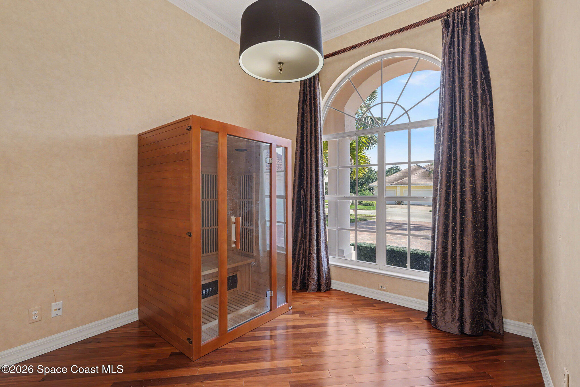 4325 Collingtree Drive Rockledge, FL 32955 - Photo 9 of 35 a view of a hallway with wooden floor and windows