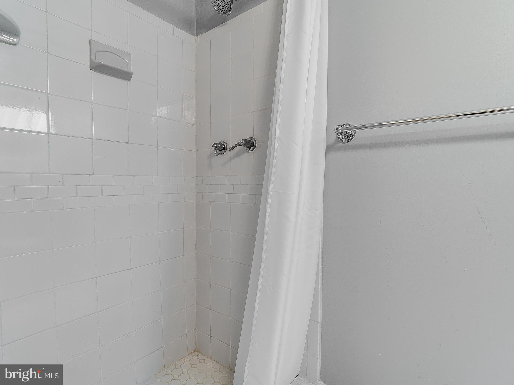 2000 Seminary Road Silver Spring, MD 20910 - Photo 22 of 30 a bathroom with a shower