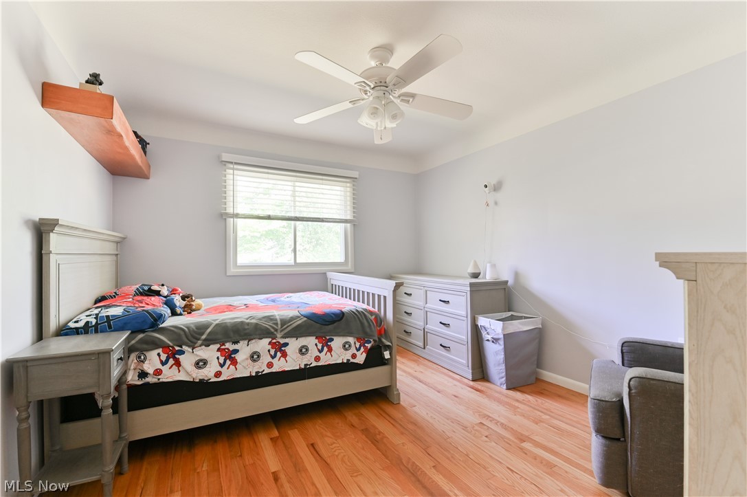 2725 Rockefeller Road Willoughby Hills, OH 44092 - Photo 10 of 21 Bedroom featuring ceiling fan and light hardwood / wood-style flooring