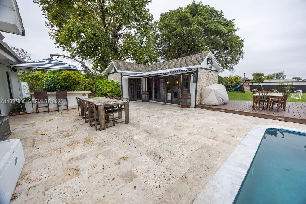 11301 Southwest 95th Street Miami, FL 33176 - Photo 38 of 56 swimming pool view with a seating space