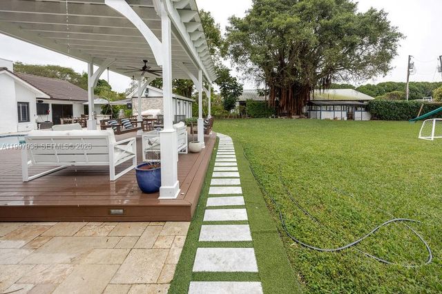 aerial view of a house with a patio