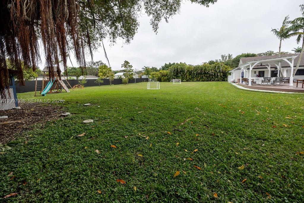 11301 Southwest 95th Street Miami, FL 33176 - Photo 52 of 56 a view of a house with a big yard