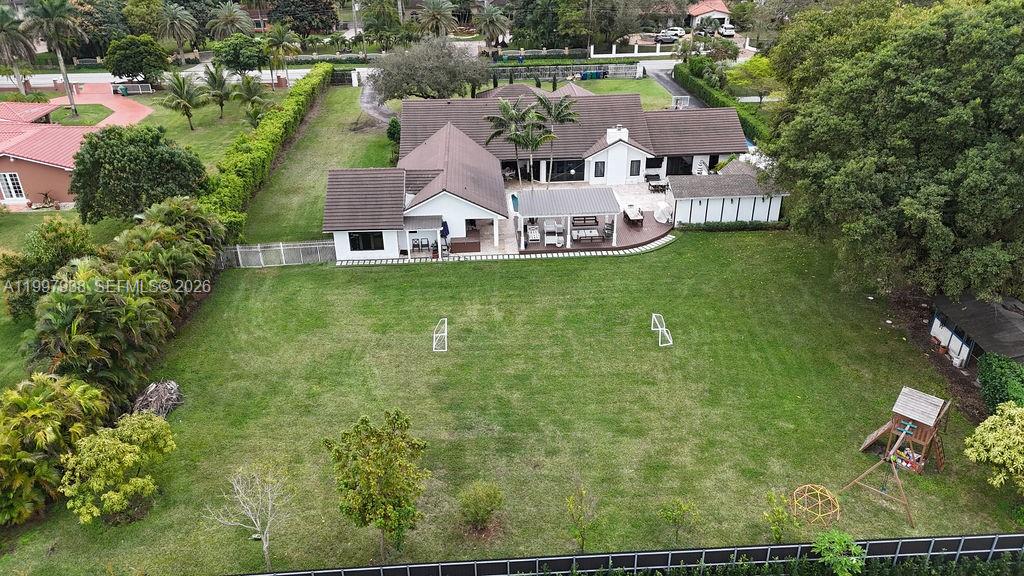 11301 Southwest 95th Street Miami, FL 33176 - Photo 55 of 56 an aerial view of residential houses with outdoor space and trees