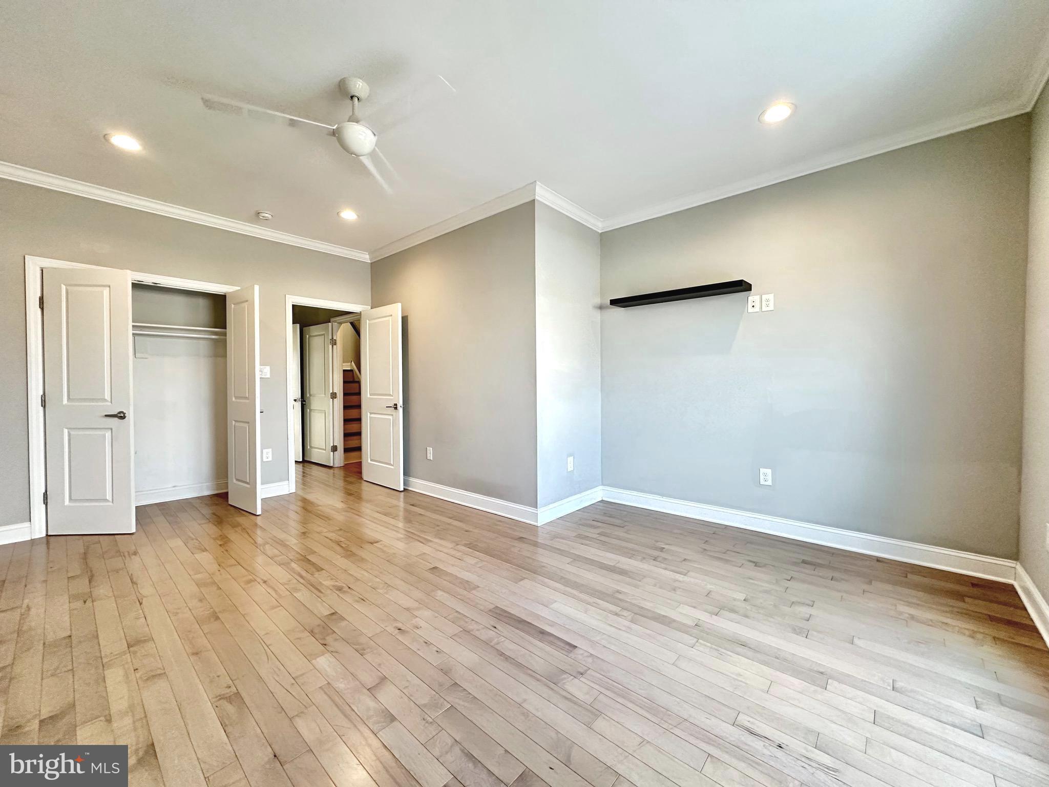 2514 West Seybert Street Philadelphia, PA 19121 - Photo 26 of 38 a view of an empty room with wooden floor