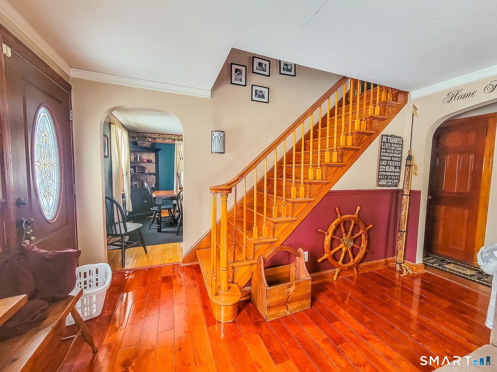 71 Cedar Lane Wallingford, CT 06492 - Photo 12 of 26 a view of entryway and hall with wooden floor