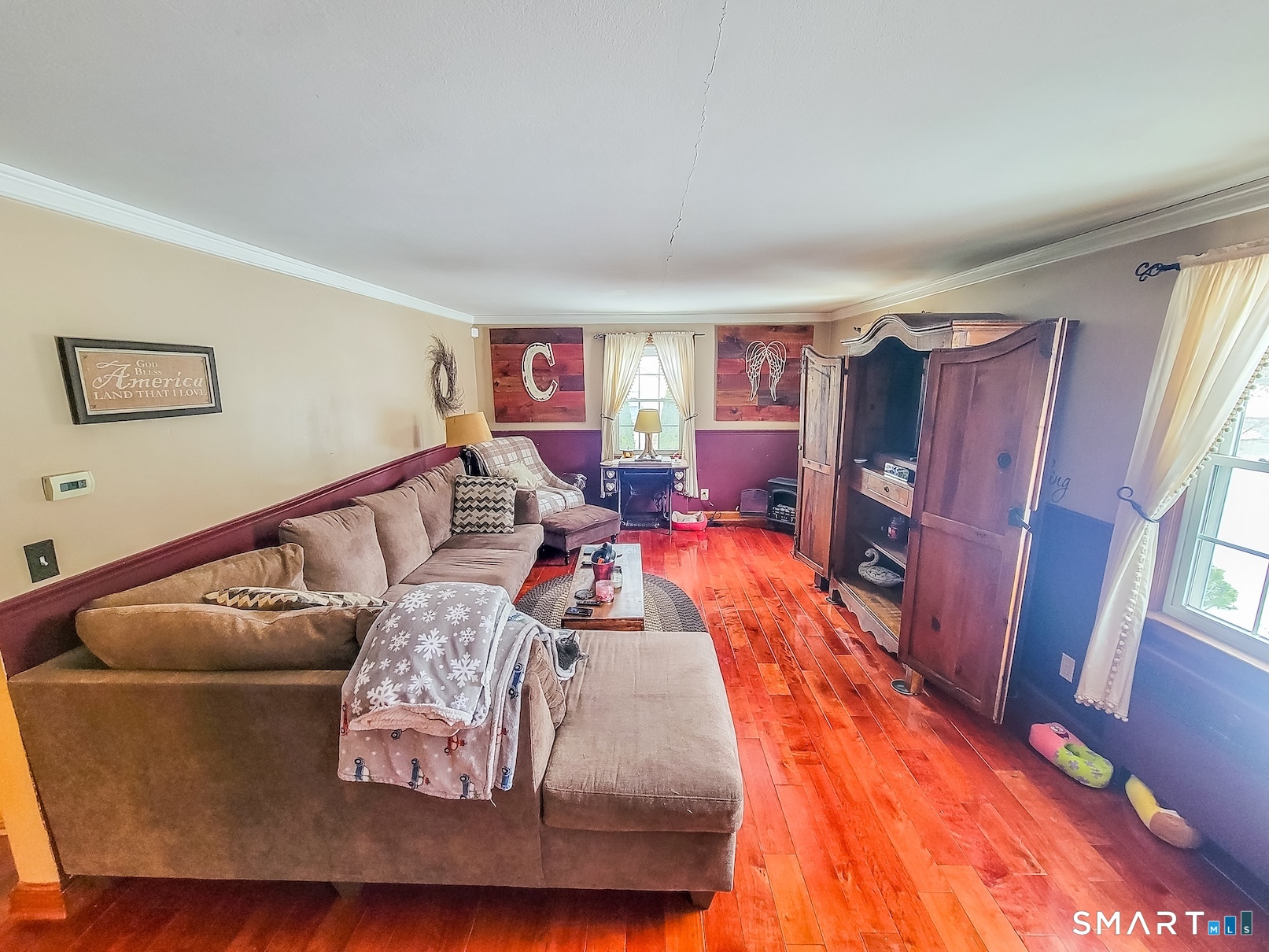 71 Cedar Lane Wallingford, CT 06492 - Photo 13 of 26 a living room with furniture fireplace and a large window
