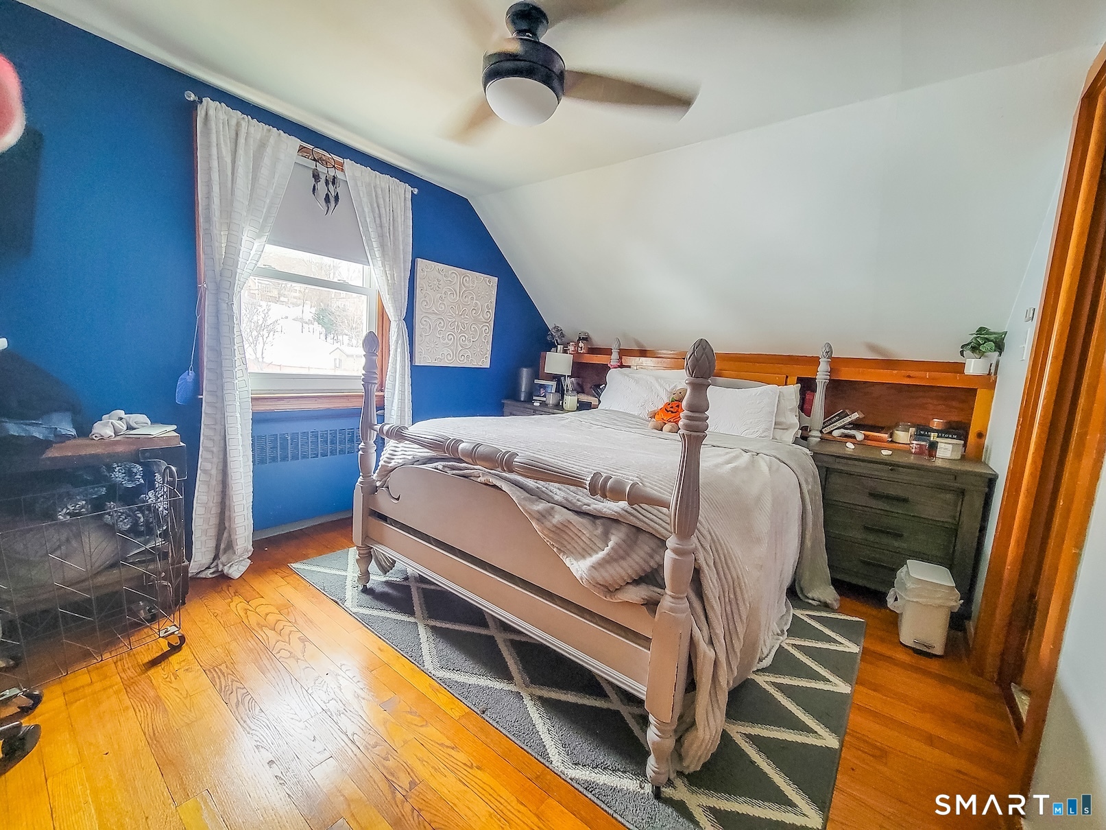 71 Cedar Lane Wallingford, CT 06492 - Photo 19 of 26 a room with a bed and a table in it