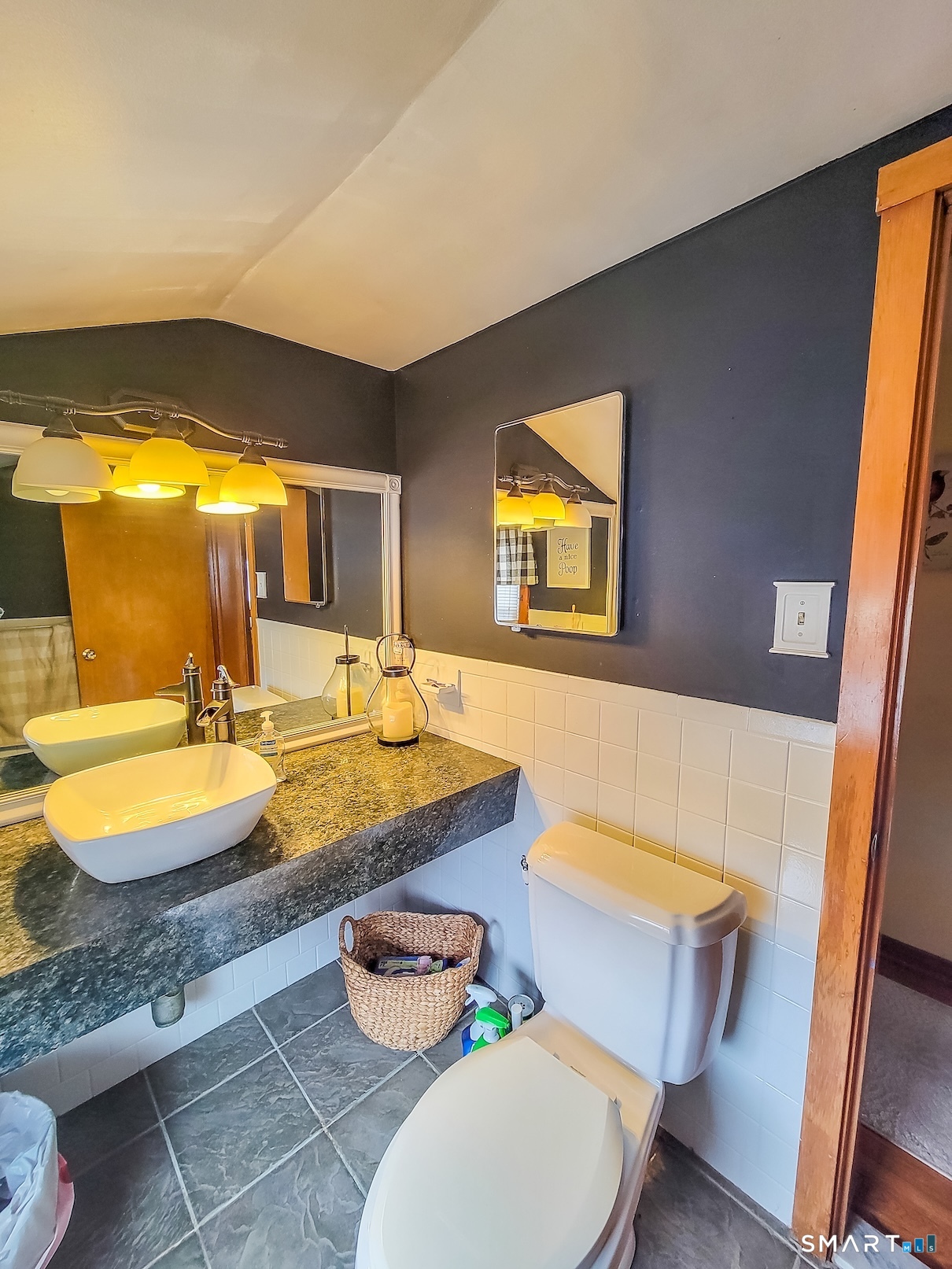 71 Cedar Lane Wallingford, CT 06492 - Photo 20 of 26 a bathroom with a granite countertop sink and a bathtub