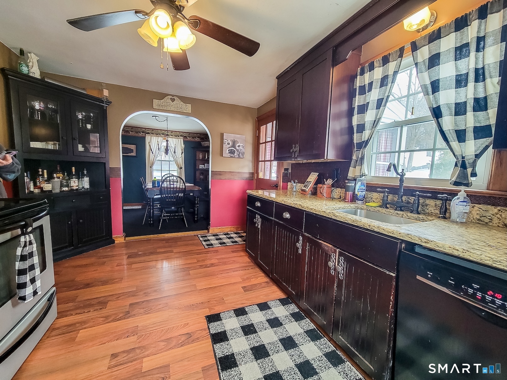 71 Cedar Lane Wallingford, CT 06492 - Photo 5 of 26 a kitchen with stainless steel appliances granite countertop a sink stove and cabinets
