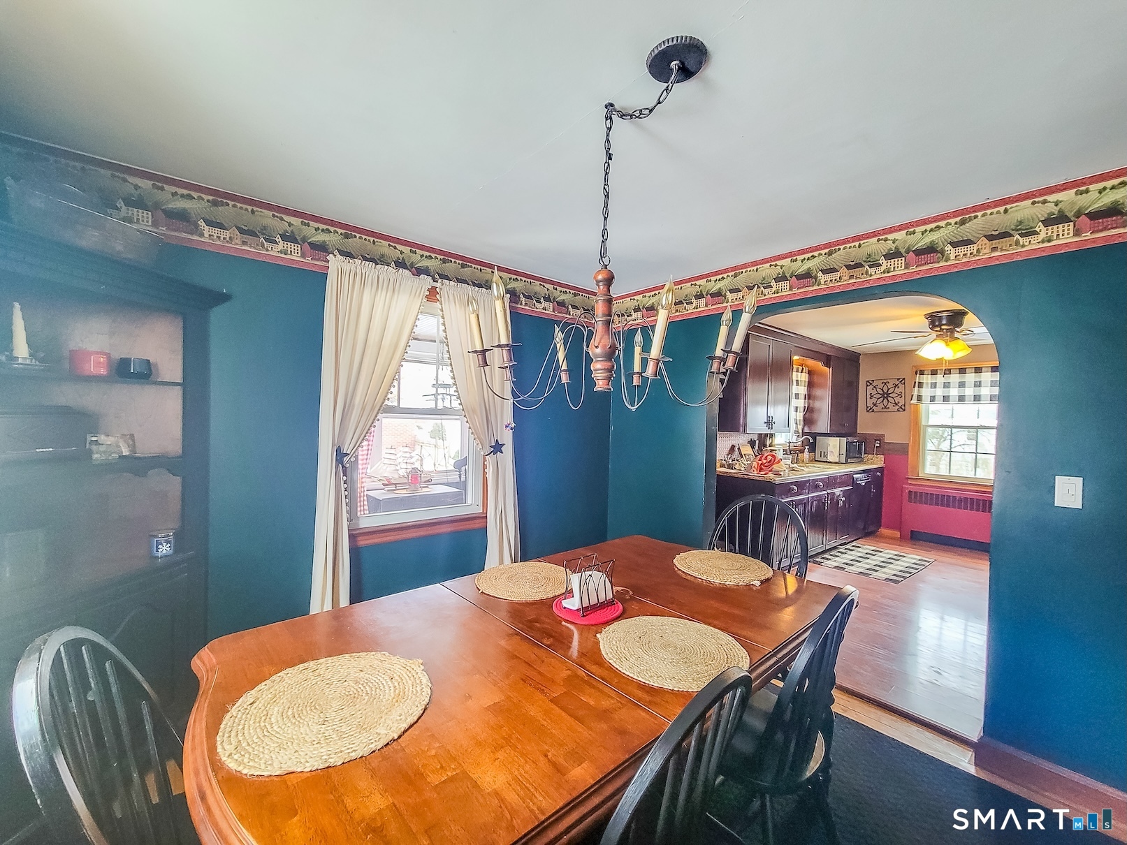 71 Cedar Lane Wallingford, CT 06492 - Photo 7 of 26 a view of a dining room with furniture window and wooden floor