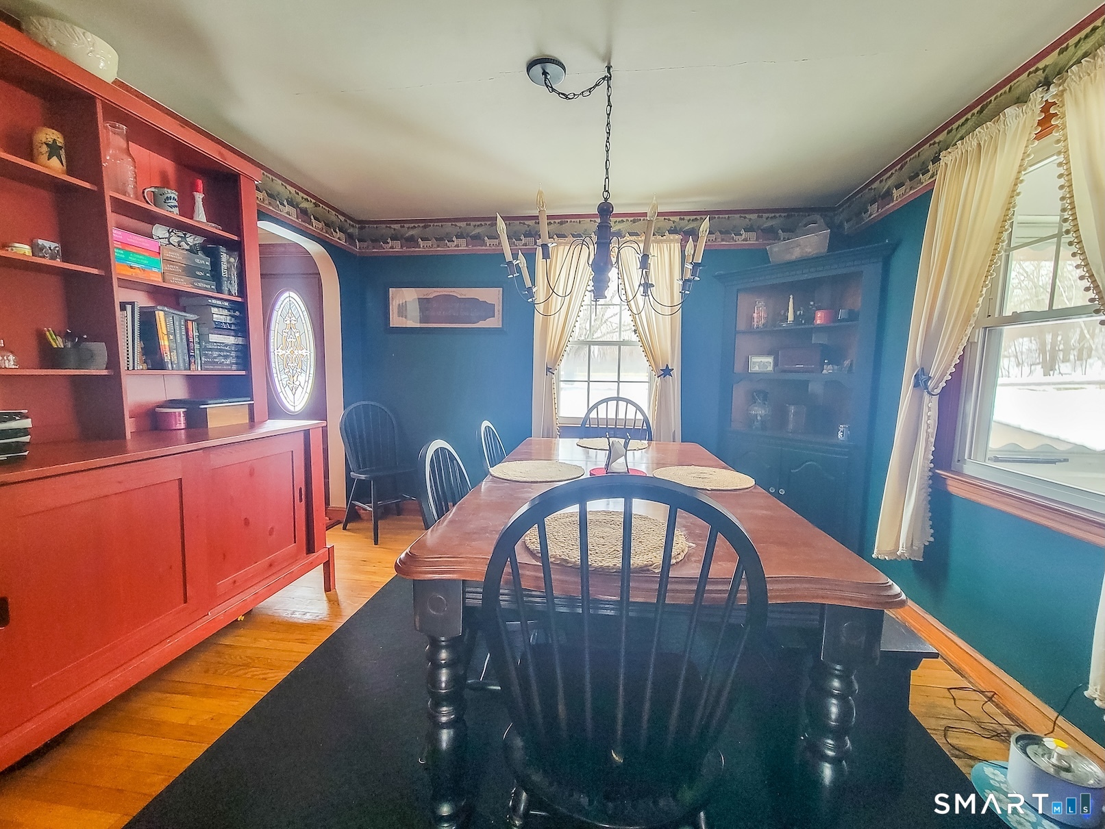 71 Cedar Lane Wallingford, CT 06492 - Photo 8 of 26 a view of a livingroom with furniture window and wooden floor