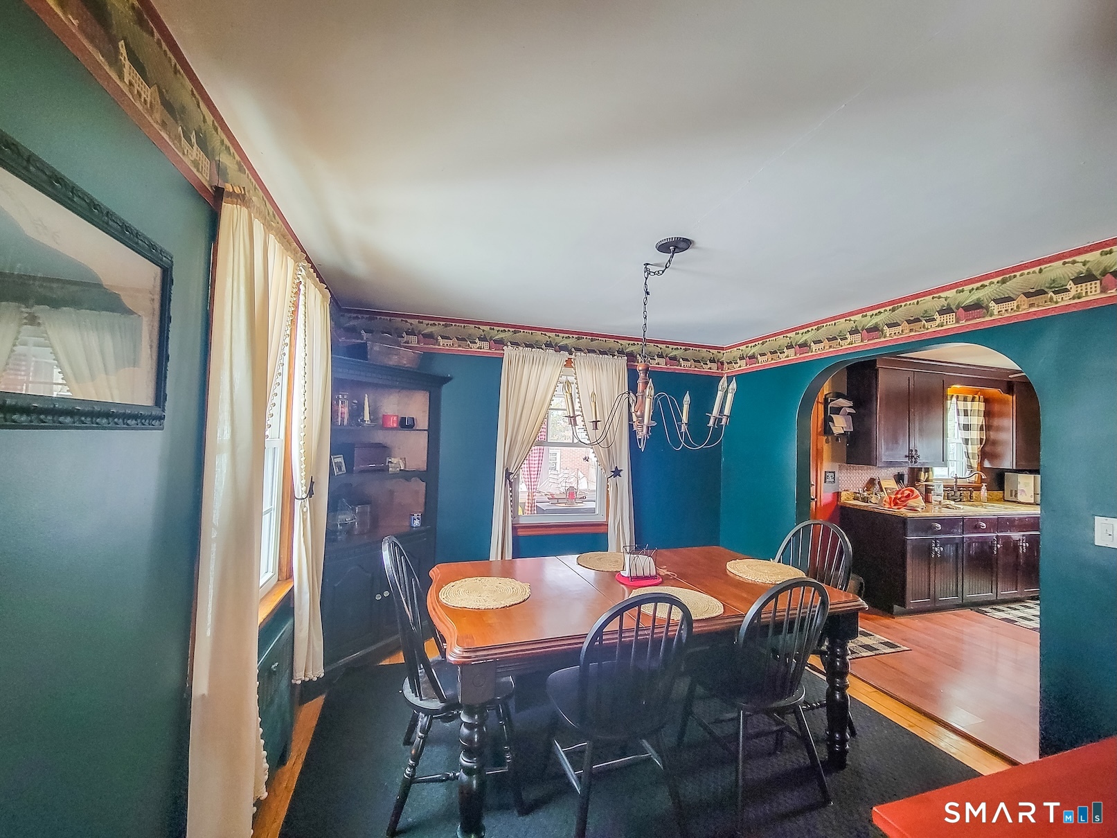 71 Cedar Lane Wallingford, CT 06492 - Photo 9 of 26 a view of a dining room with furniture window and wooden floor