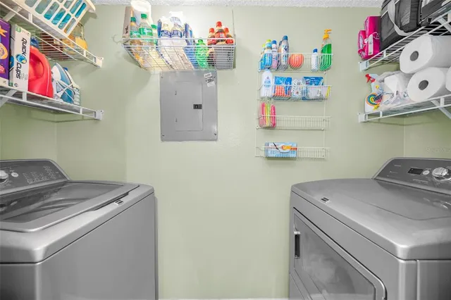 a utility room with dryer and washer
