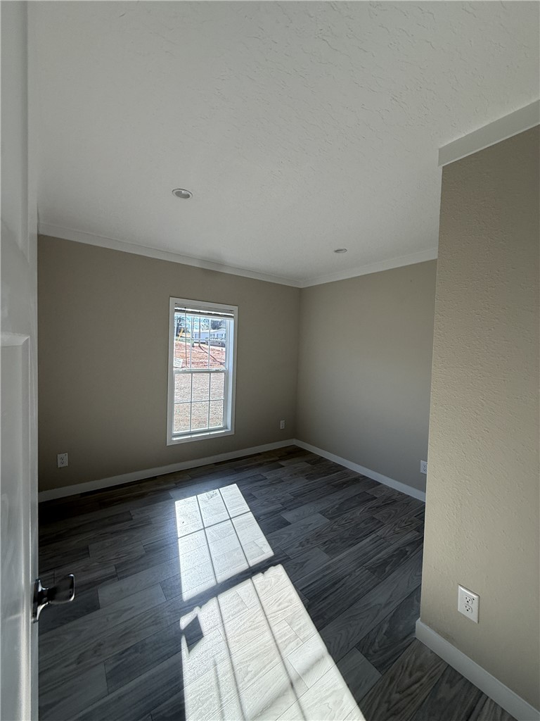 121 Candlestick Lane Seneca, SC 29678 - Photo 14 of 17 This airy space features natural light and durable flooring, offering a versatile blank canvas.