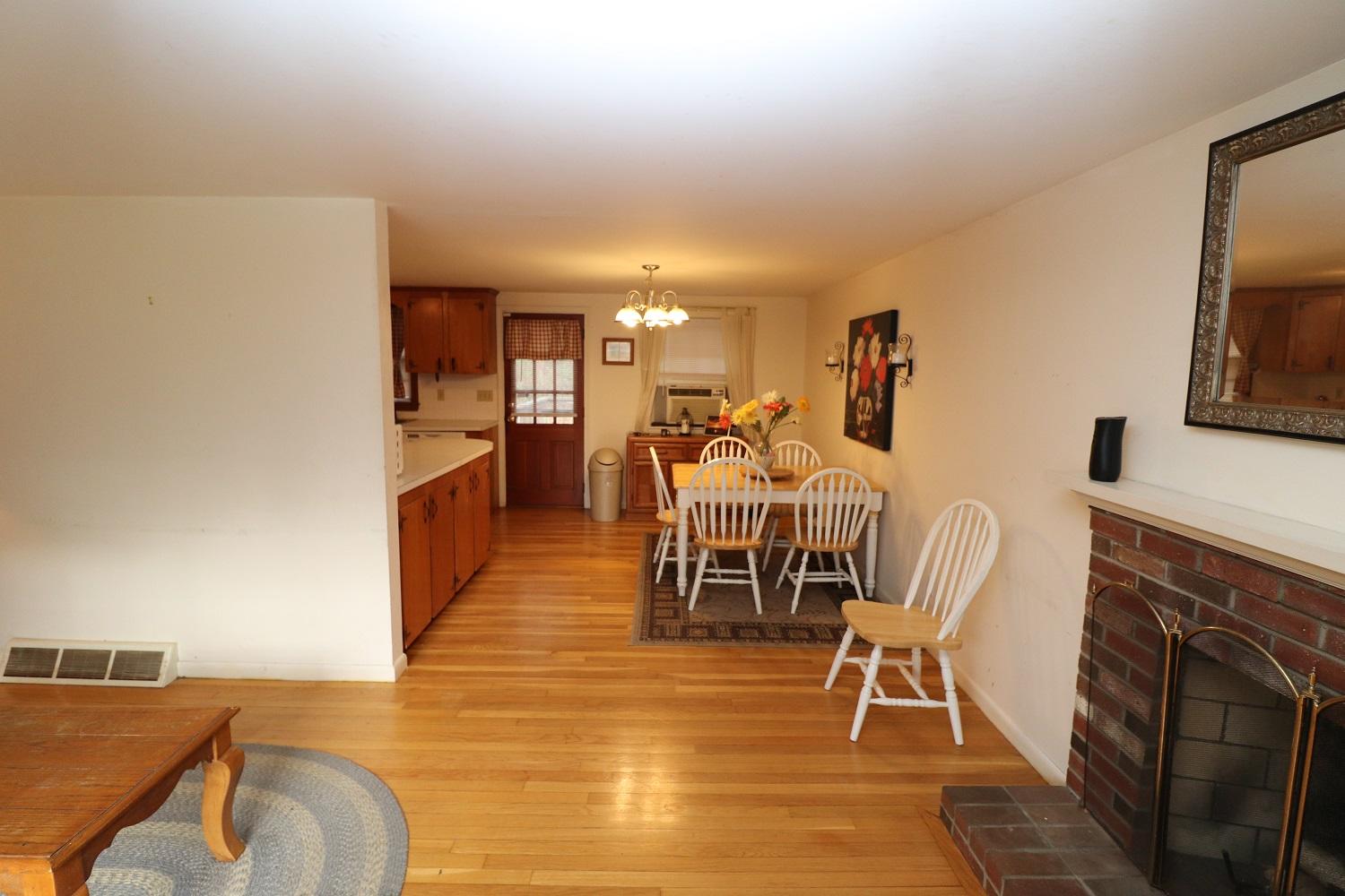 58 Sterling Road Hyannis, MA 02601 - Photo 3 of 19 a view of a dining room with furniture and wooden floor