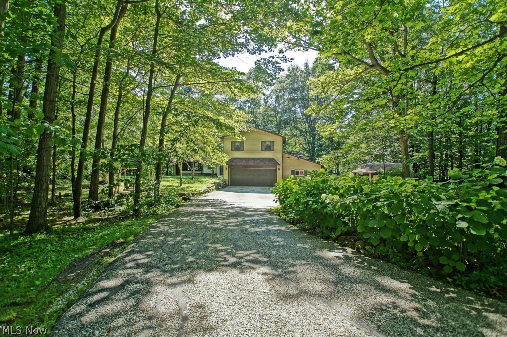 12154 Concord Hambden Road Painesville, OH 44077 - Photo 2 of 25 Set back from the road allowing for privacy.