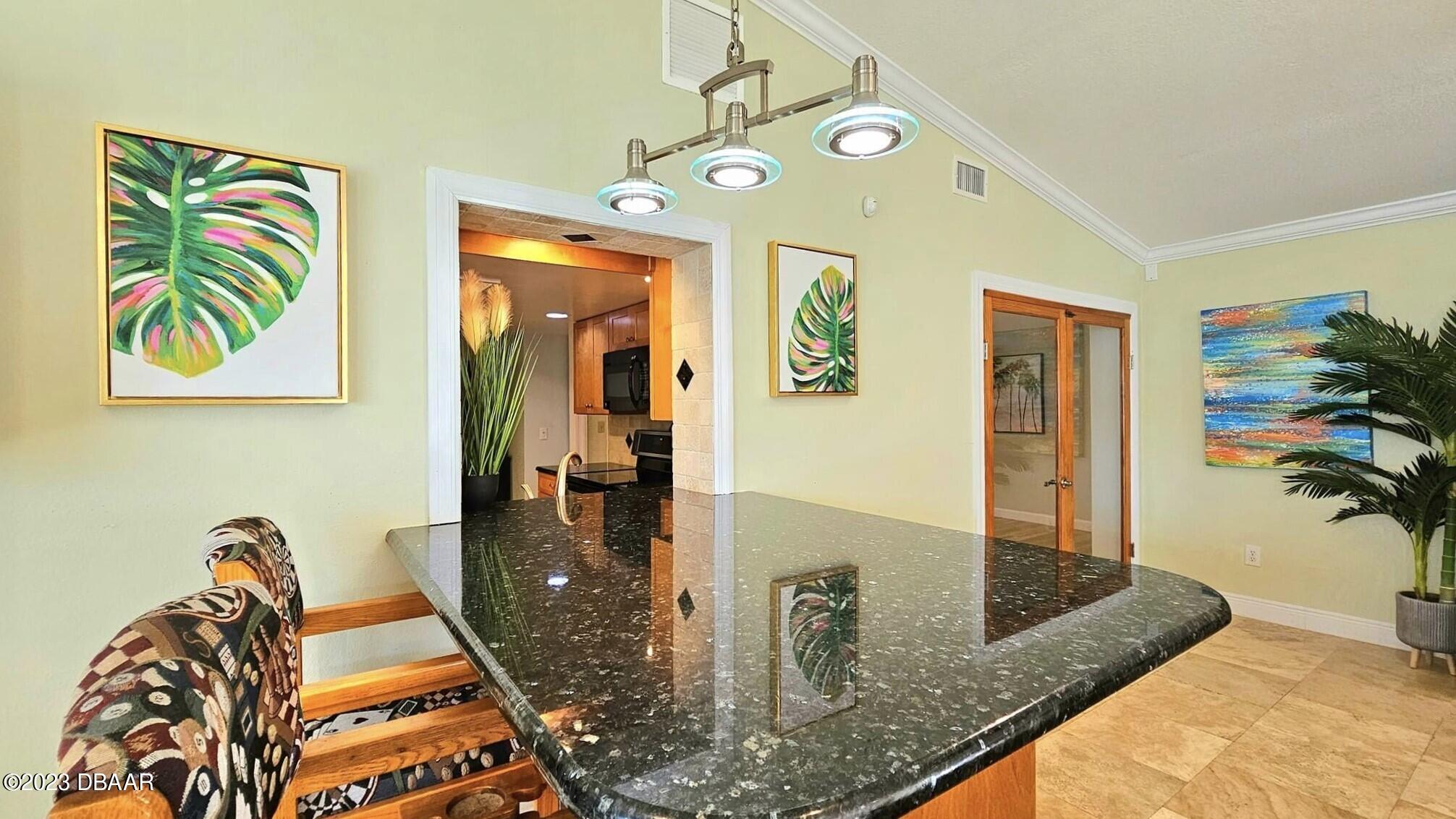 6 Sunrise Avenue Ormond Beach, FL 32176 - Photo 20 of 83 a view of a living room and dining room