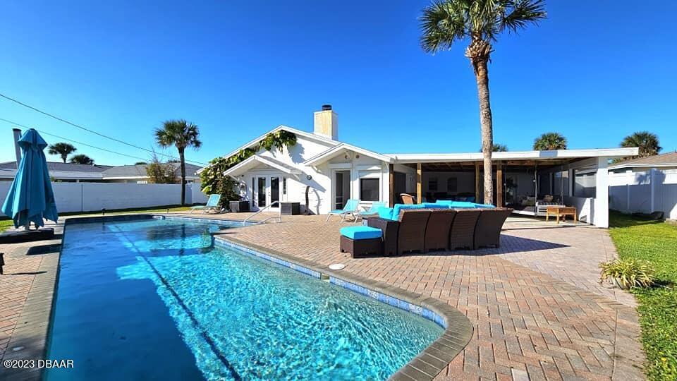 6 Sunrise Avenue Ormond Beach, FL 32176 - Photo 3 of 83 a view of house with yard outdoor seating and entertaining space