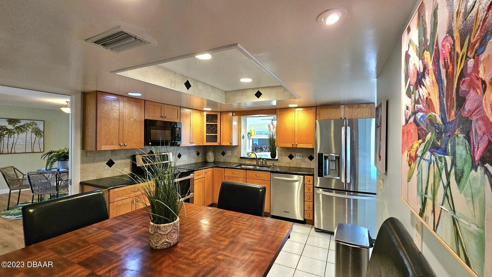 6 Sunrise Avenue Ormond Beach, FL 32176 - Photo 37 of 83 a kitchen with lots of counter top space