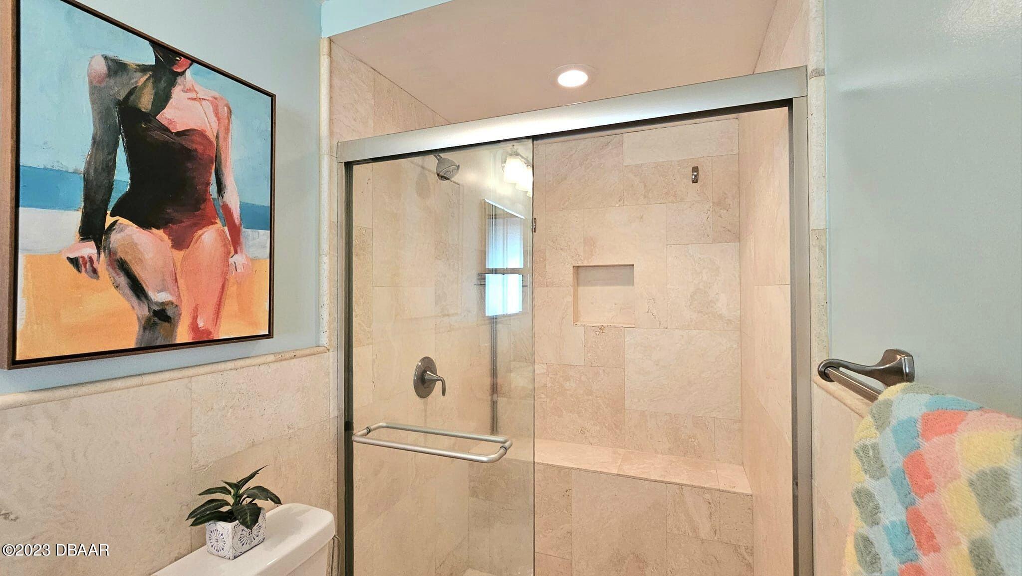 6 Sunrise Avenue Ormond Beach, FL 32176 - Photo 49 of 83 a bathroom with a shower and a sink