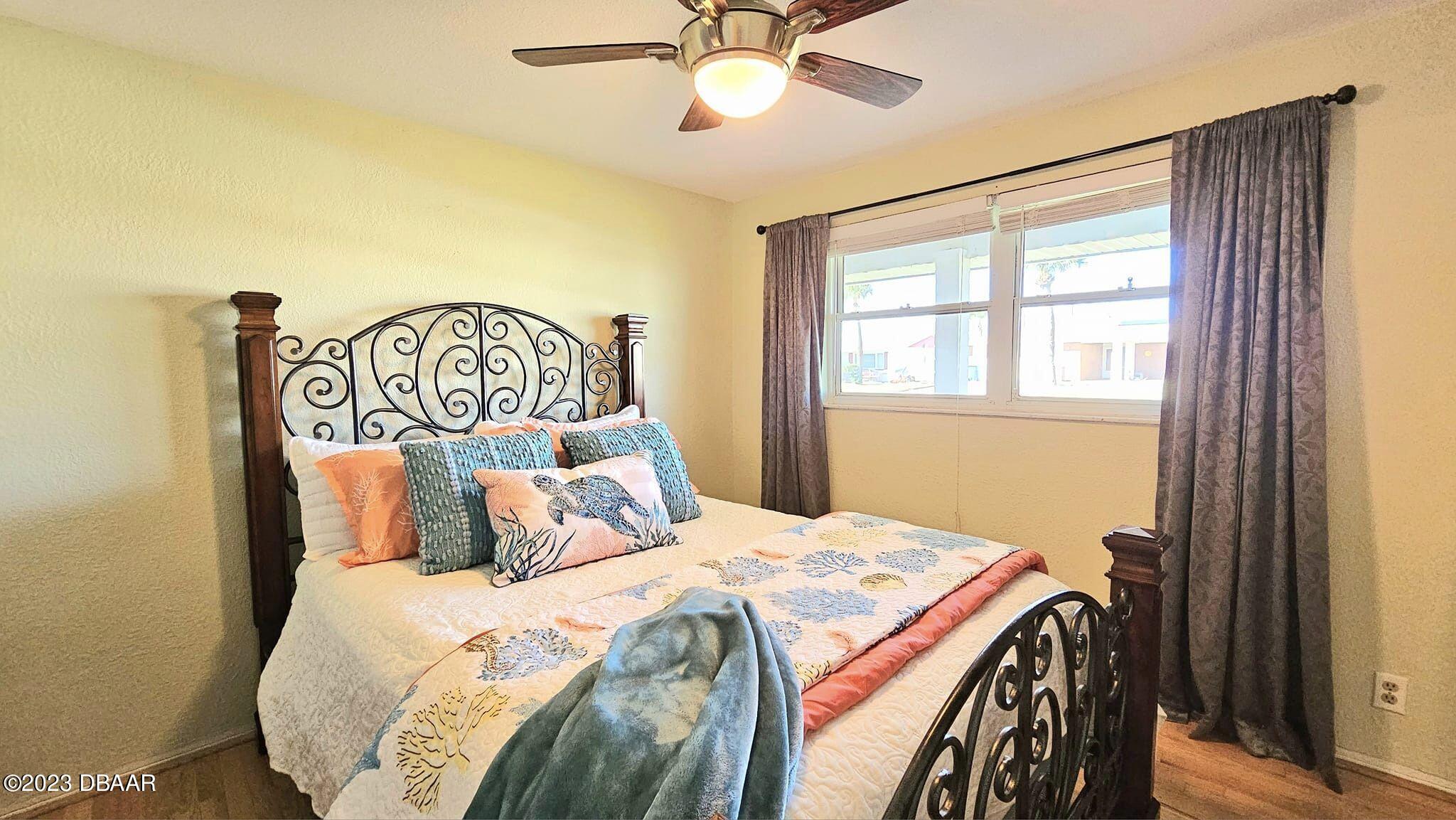 6 Sunrise Avenue Ormond Beach, FL 32176 - Photo 56 of 83 a bedroom with a bed and a window